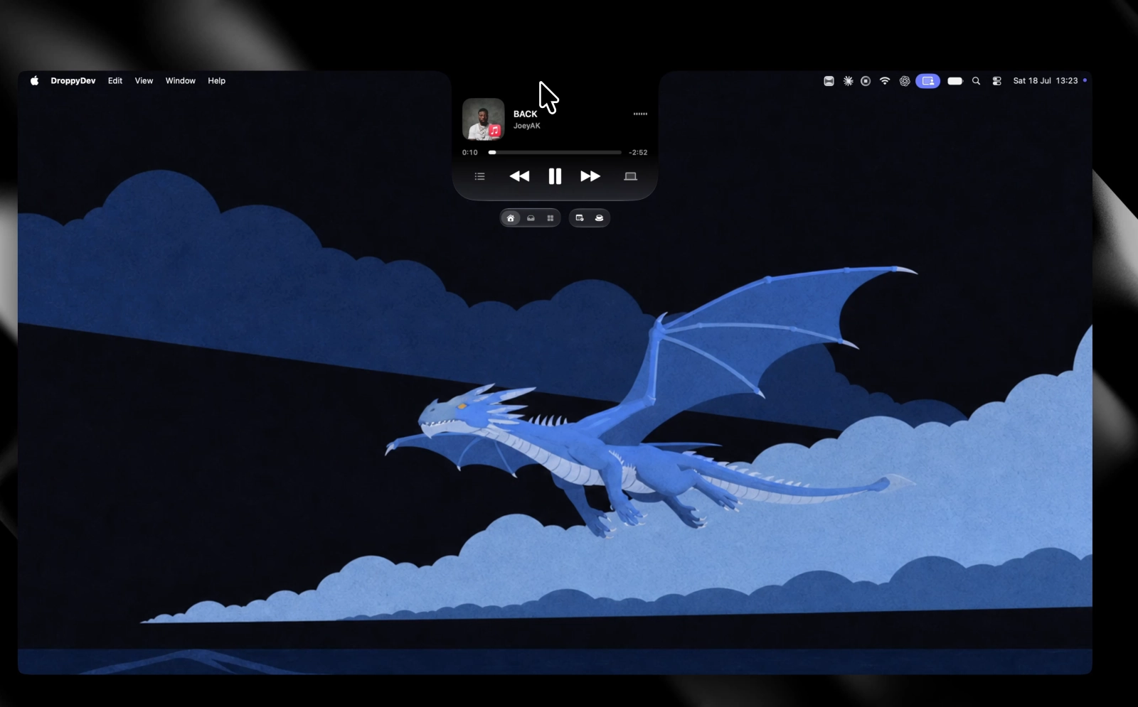 Droppy 14.2 beta 2 showing the expanded media HUD above the Shelf navigation controls.